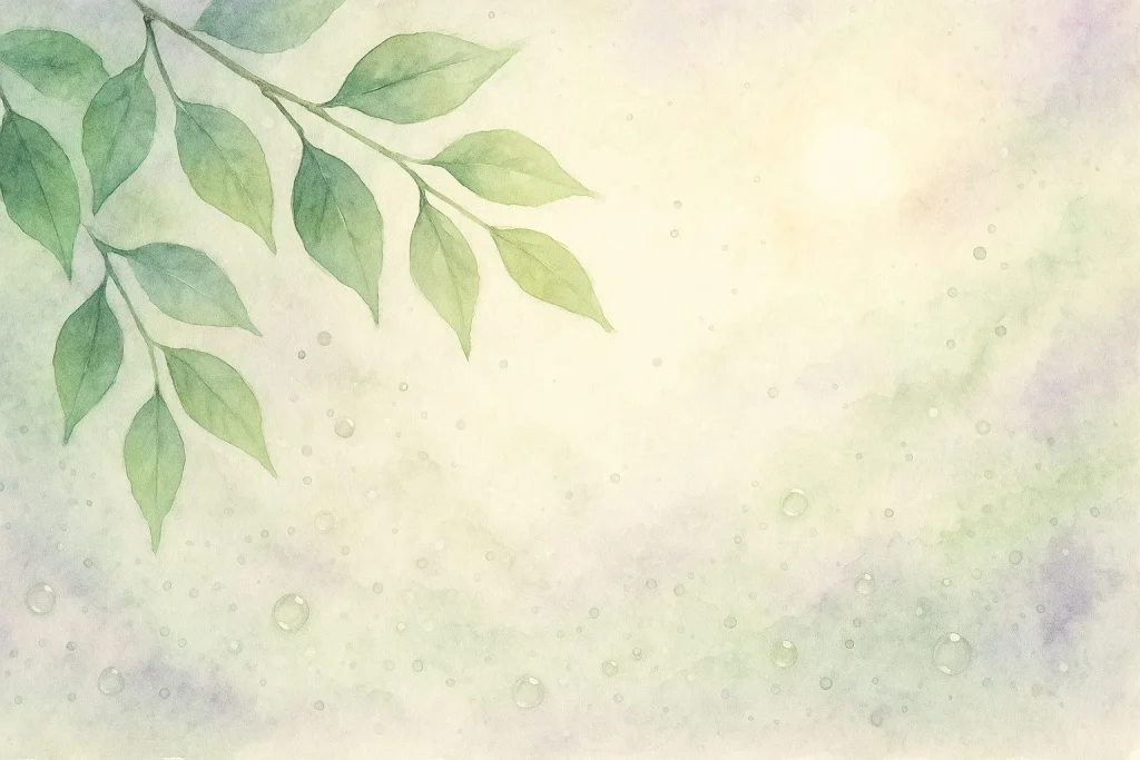 Rolig naturinspireret scene med blade, sollys og en let tåge af oliedråber